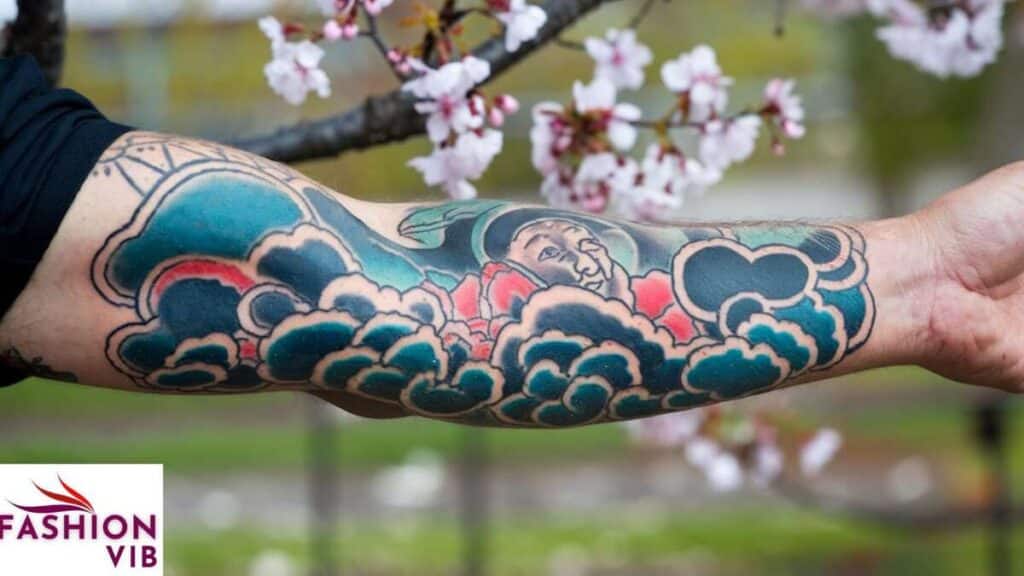 Forearm clouding tattoo